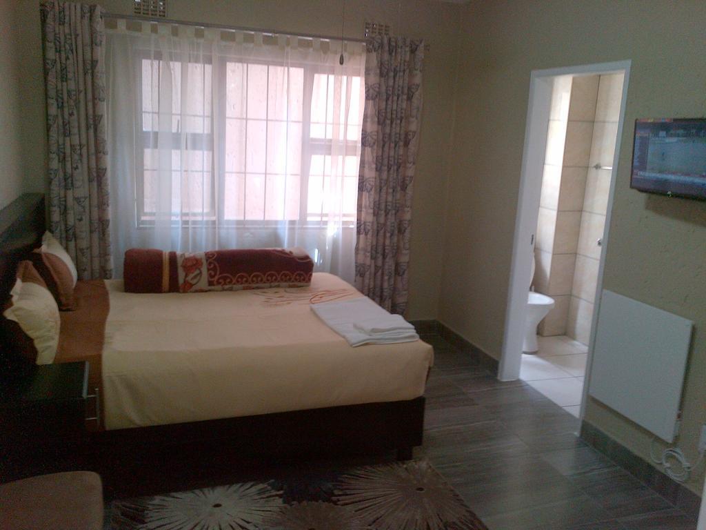 Chisam Guest Lodge Pty Ltd 요하네스버그 객실 사진